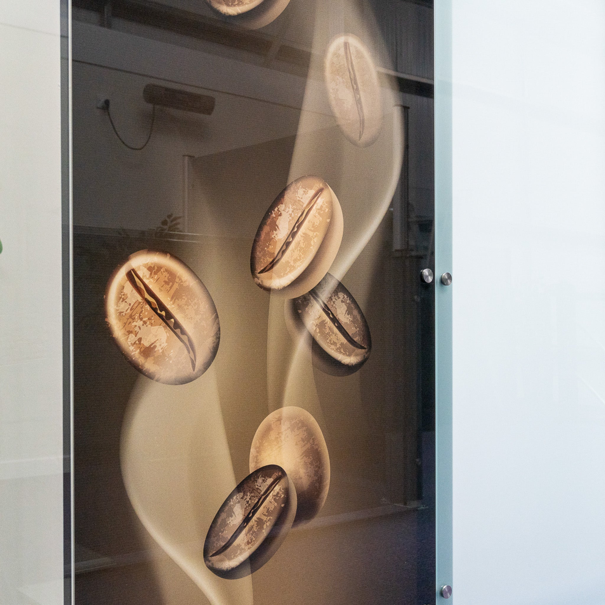 Glass panel printed with floating coffee beans