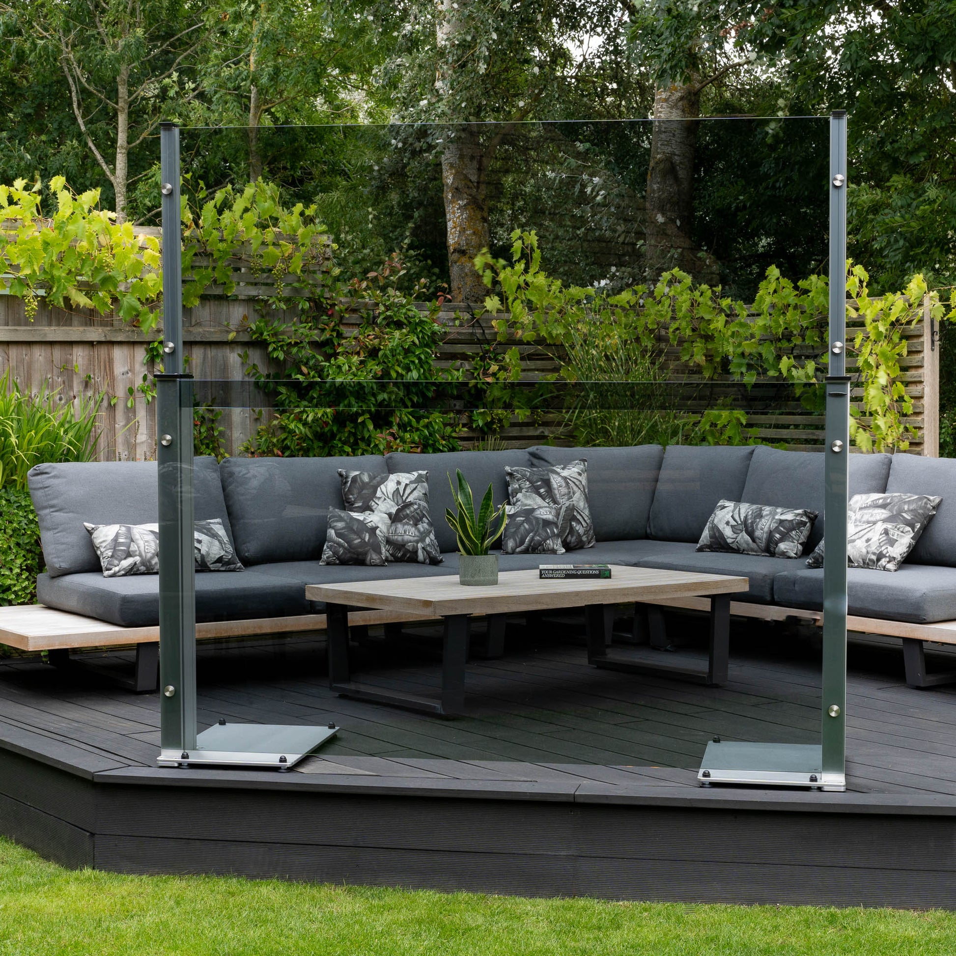Freestanding dark grey glass balustrade extended to 6ft tall