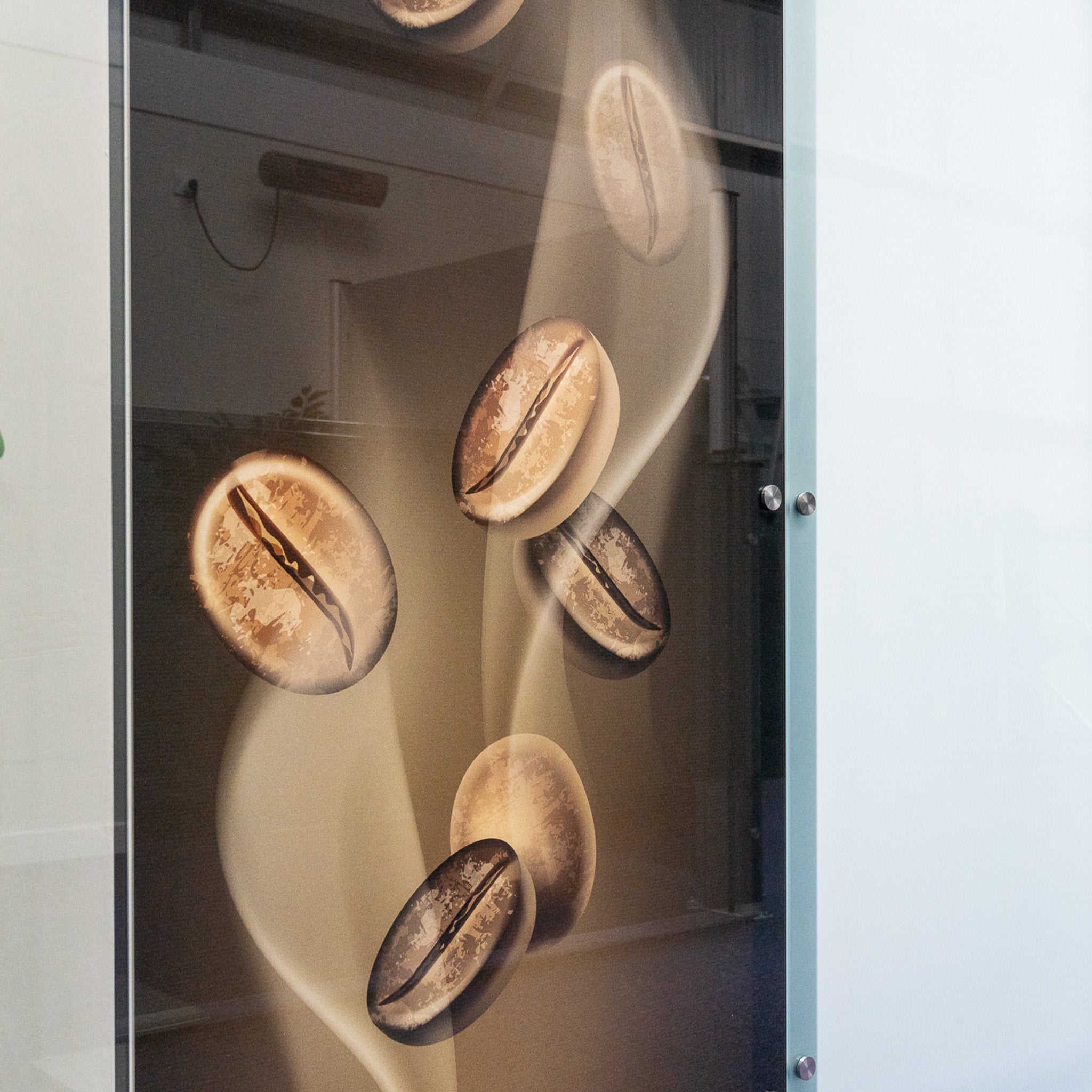 Glass panel printed with floating coffee beans 