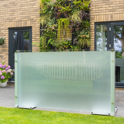 Frosted freestanding glass panel on a patio